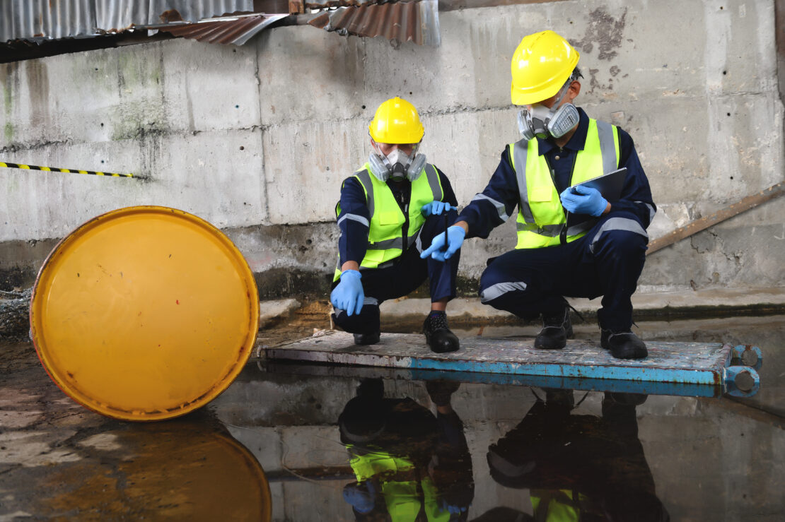 Two Officers of Environmental Engineering Wearing Protective Equipment