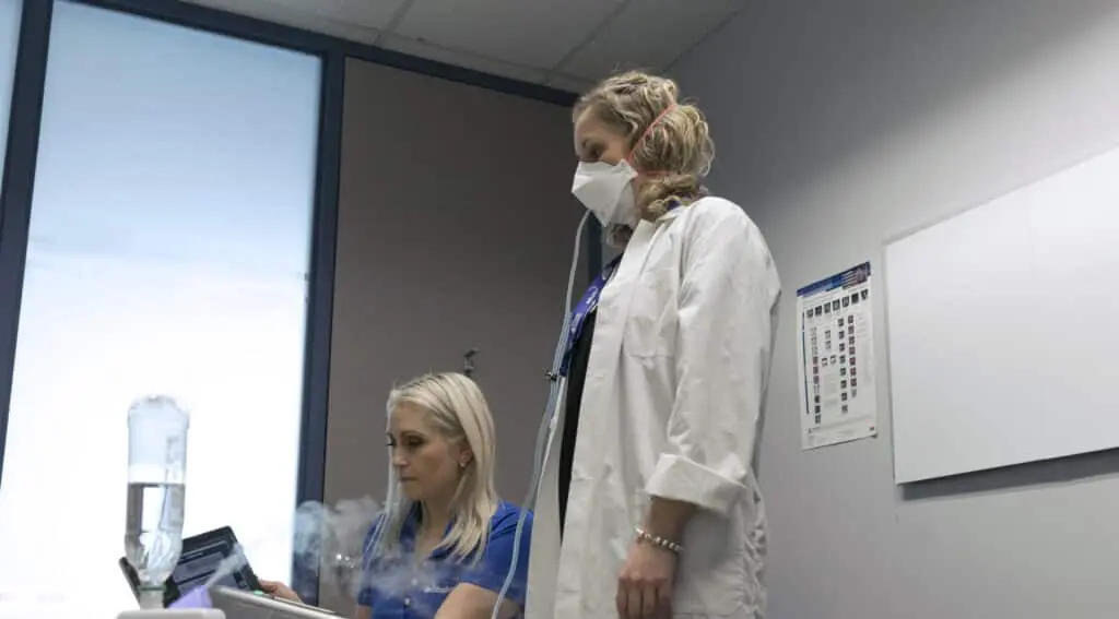 healthcare professionals performing a Quantitative Respirator Fit Test