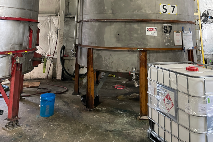 Collection of large tanks at industrial facility