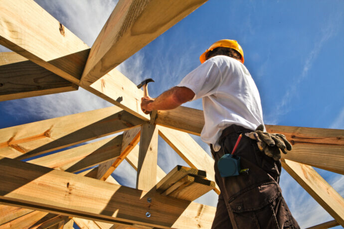 carpenter working on a building