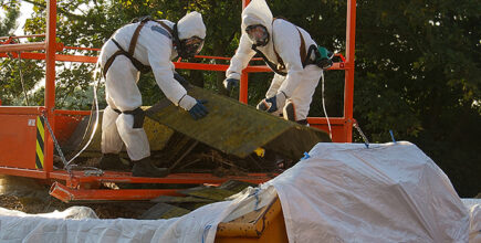 Remediation crew cleaning up job site